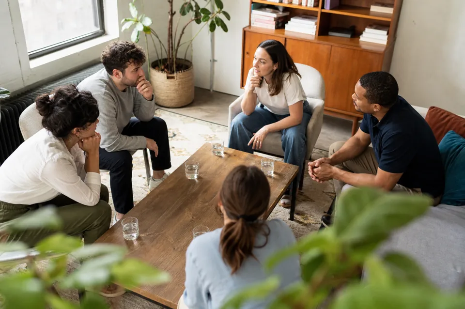 Friends thinking through a spoken word game